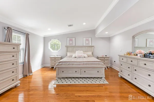 a bedroom with a bed and closet