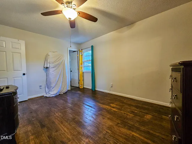 a view of a livingroom with a dishwasher and a stove top oven