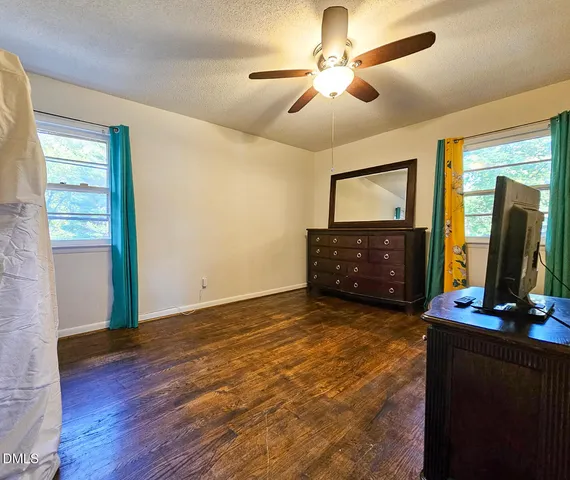 a view of a livingroom with a flat screen tv
