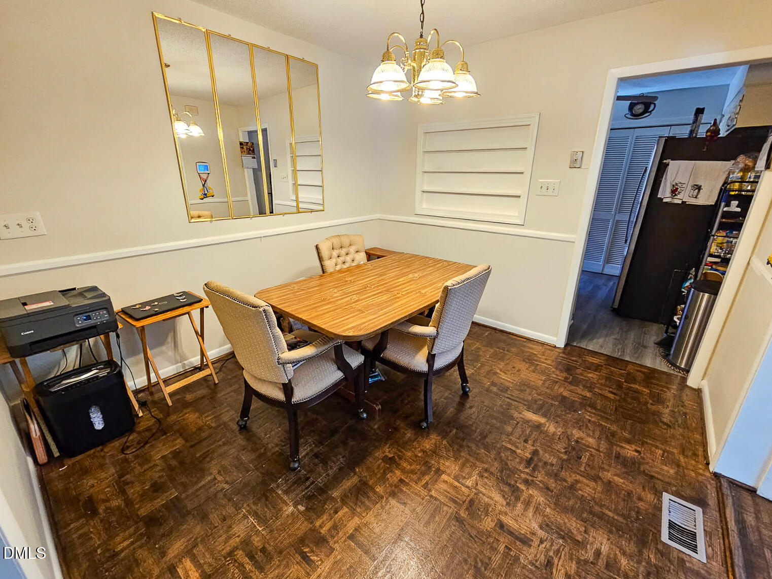 2212 Sanderford Road Raleigh, NC 27610 - Photo 6 of 28 a dining room with furniture and chandelier