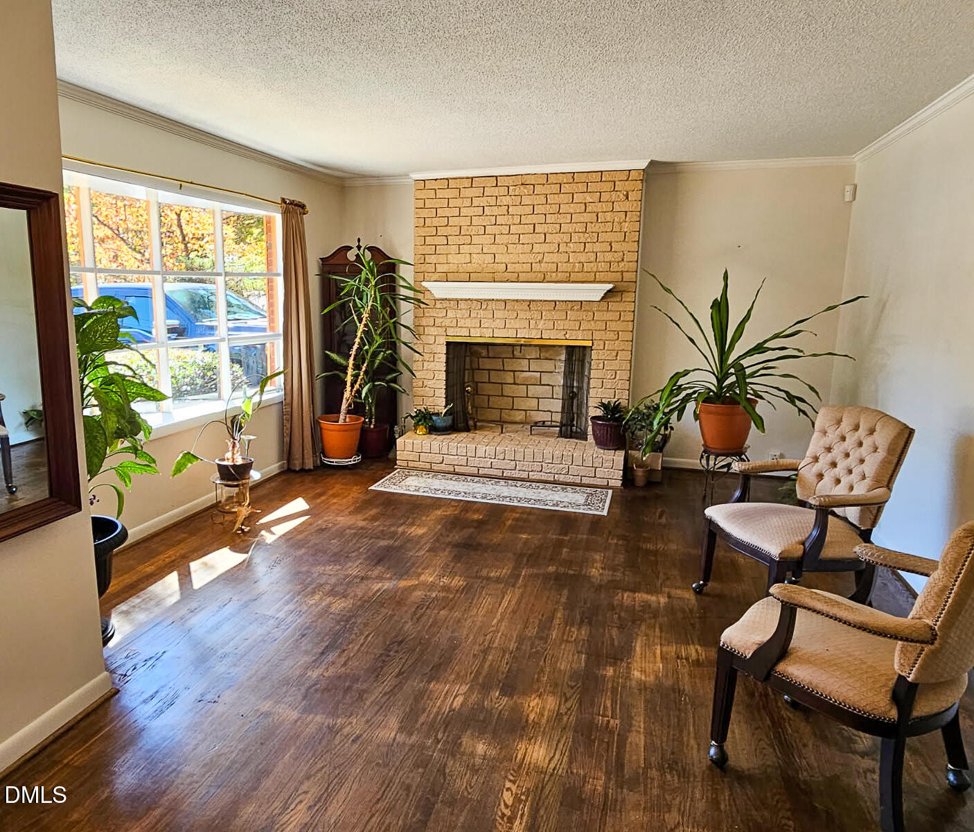 2212 Sanderford Road Raleigh, NC 27610 - Photo 10 of 28 a living room with patio furniture and a floor to ceiling window