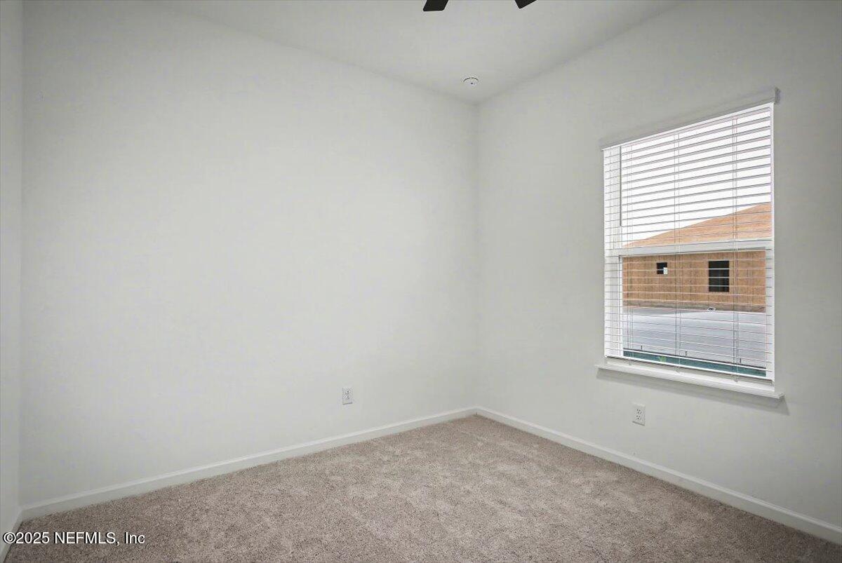 2692 Field Daisy Ln Green Cove Springs Green Cove Springs, FL 32043 - Photo 15 of 37 an empty room with a window