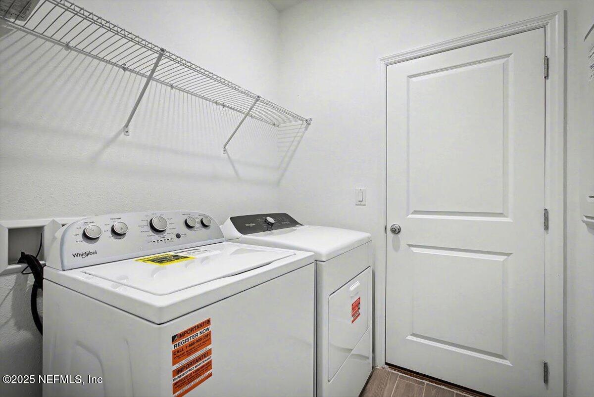 2692 Field Daisy Ln Green Cove Springs Green Cove Springs, FL 32043 - Photo 25 of 37 a utility room with dryer and washer