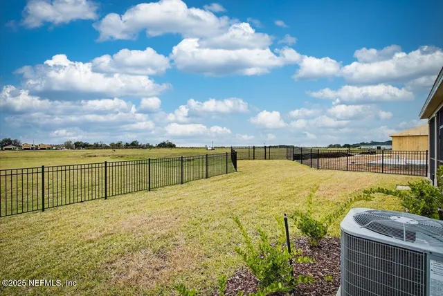 a view of a lake with a building in the background