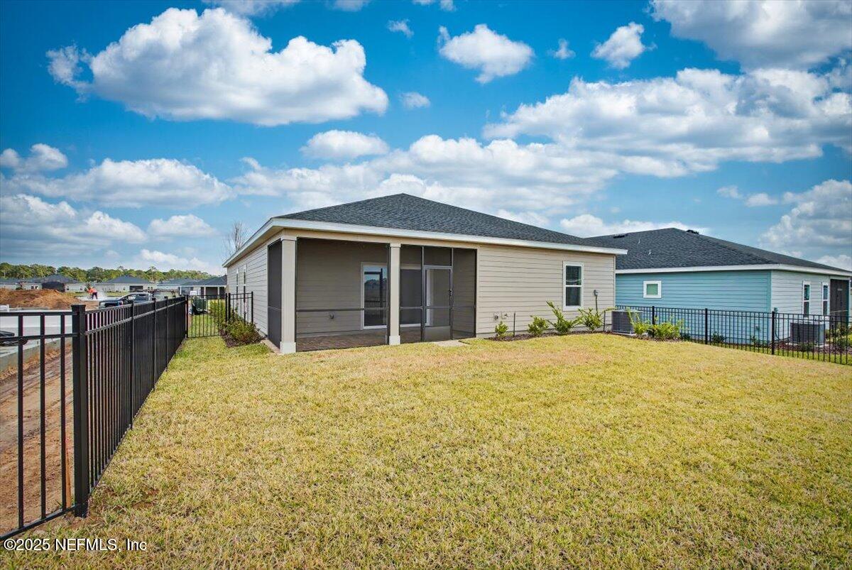 2692 Field Daisy Ln Green Cove Springs Green Cove Springs, FL 32043 - Photo 28 of 37 a view of a house with a patio