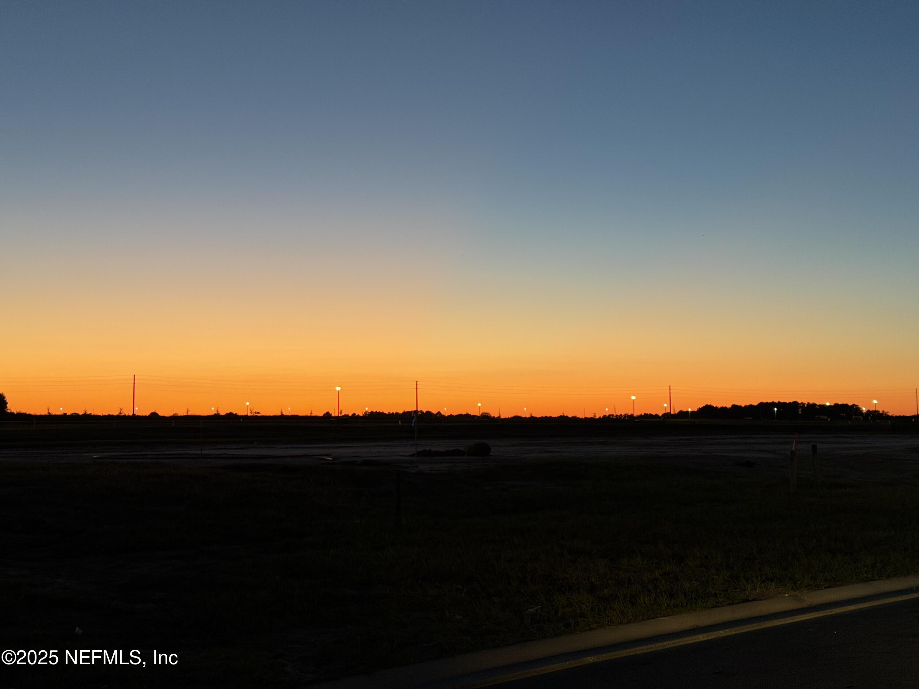 2692 Field Daisy Ln Green Cove Springs Green Cove Springs, FL 32043 - Photo 35 of 37 a view of a sunset