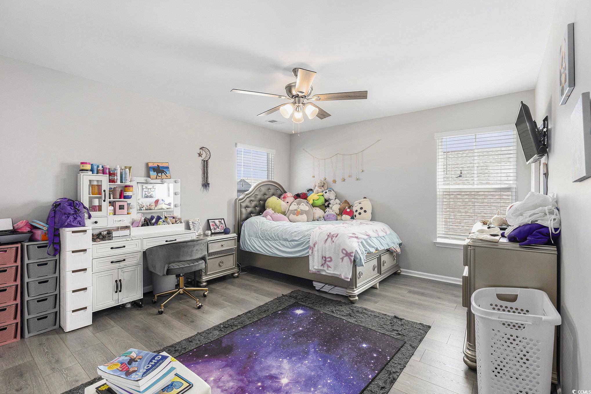 312 Cattle Drive Circle Myrtle Beach, SC 29588 - Photo 20 of 34 Living area featuring light wood-style flooring and a ceiling fan