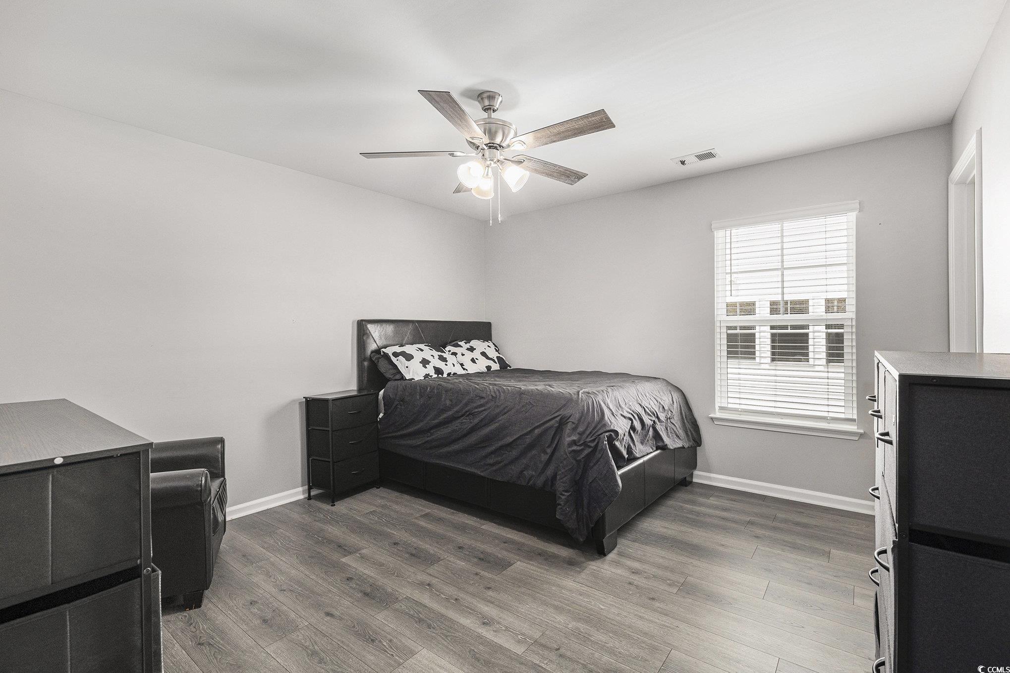 312 Cattle Drive Circle Myrtle Beach, SC 29588 - Photo 26 of 34 Bedroom featuring light wood-style flooring and ceiling fan
