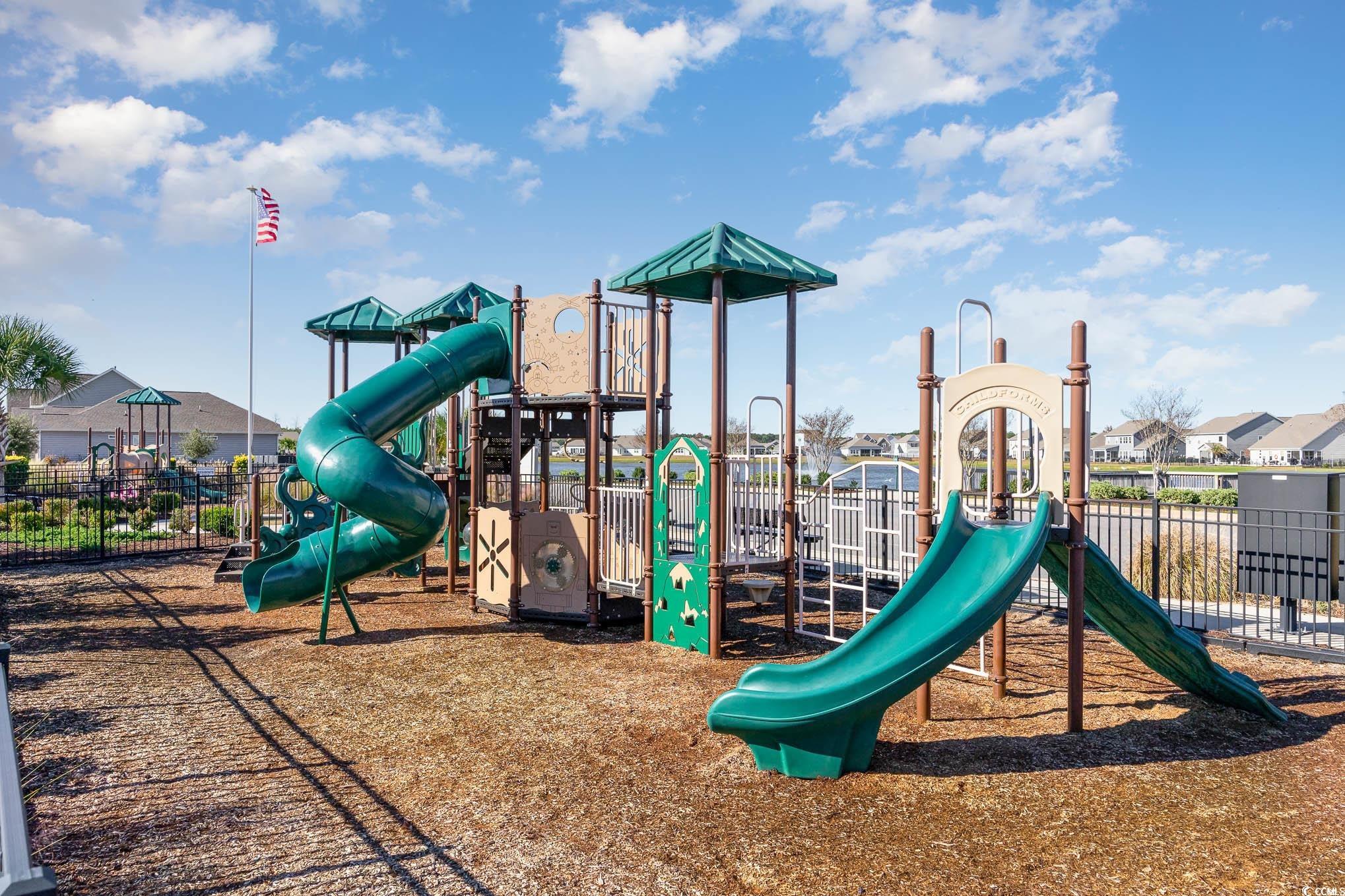 312 Cattle Drive Circle Myrtle Beach, SC 29588 - Photo 31 of 34 Community pool with a patio and an outbuilding