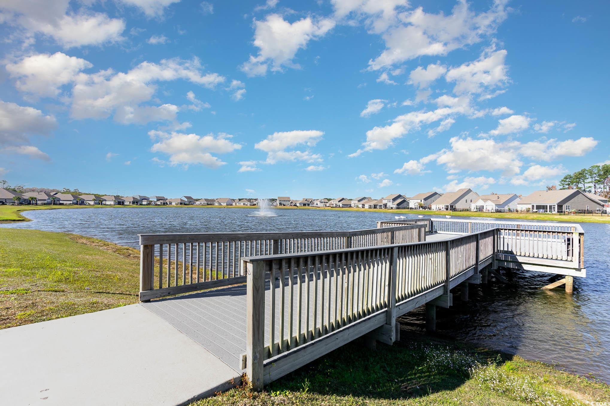 312 Cattle Drive Circle Myrtle Beach, SC 29588 - Photo 32 of 34 Aerial perspective of suburban area with a large body of water and a pool