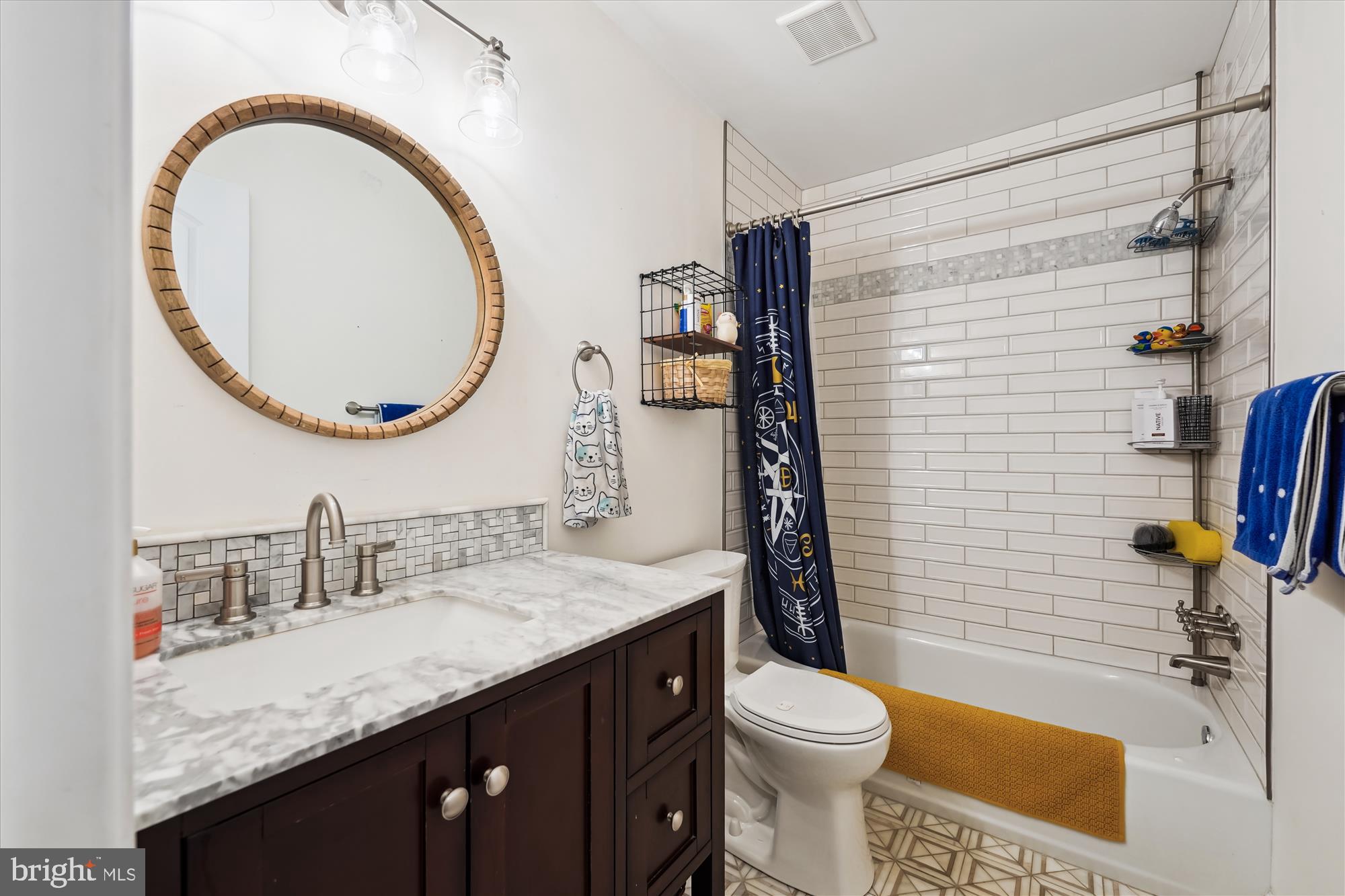5404 Well Spring Road La Plata, MD 20646 - Photo 23 of 34 a bathroom with a granite countertop toilet sink and mirror