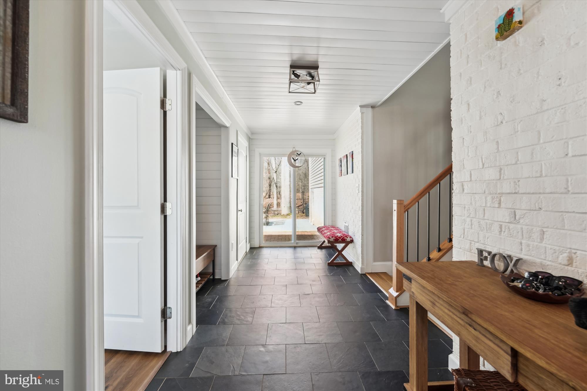 5404 Well Spring Road La Plata, MD 20646 - Photo 5 of 34 a room with furniture and a chandelier