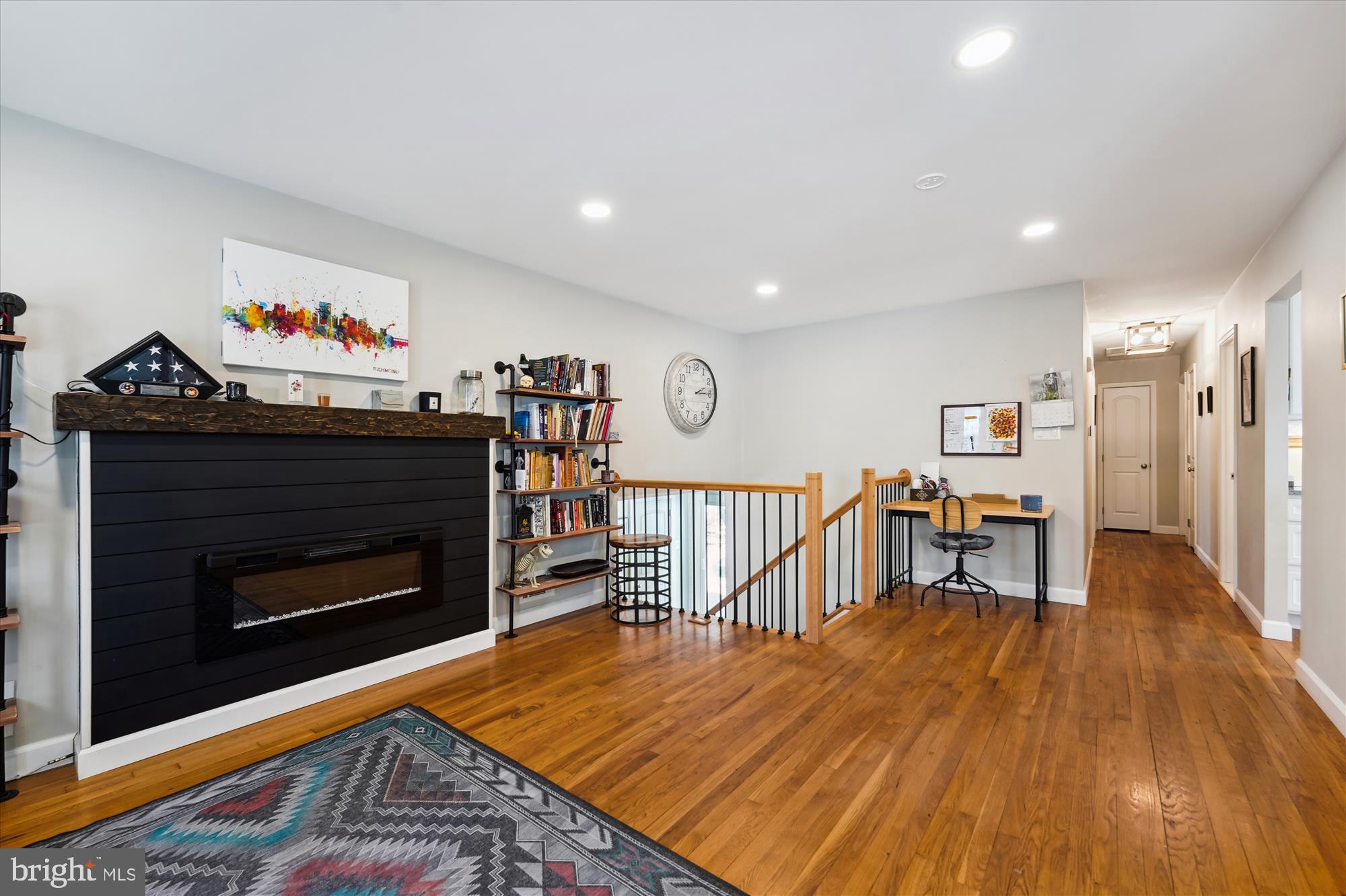 5404 Well Spring Road La Plata, MD 20646 - Photo 8 of 34 a living room with furniture a fireplace and a flat screen tv