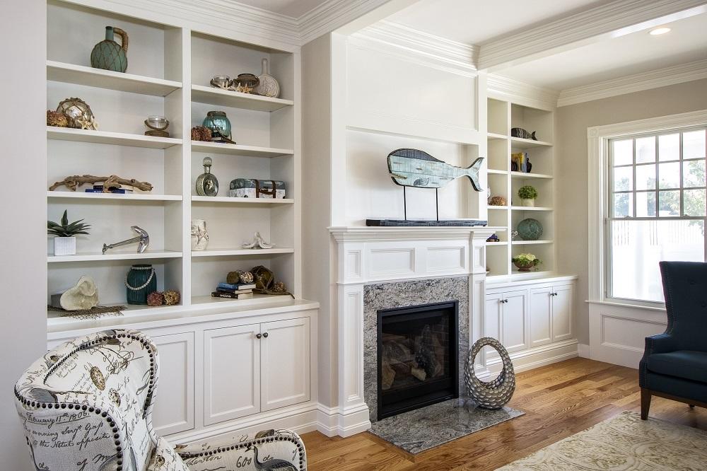 12 Coastline Drive Mashpee, MA 02649 - Photo 15 of 46 a living room with furniture and a fireplace