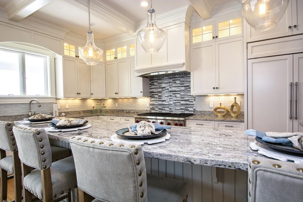 12 Coastline Drive Mashpee, MA 02649 - Photo 16 of 46 a kitchen with stainless steel appliances granite countertop a stove and a refrigerator