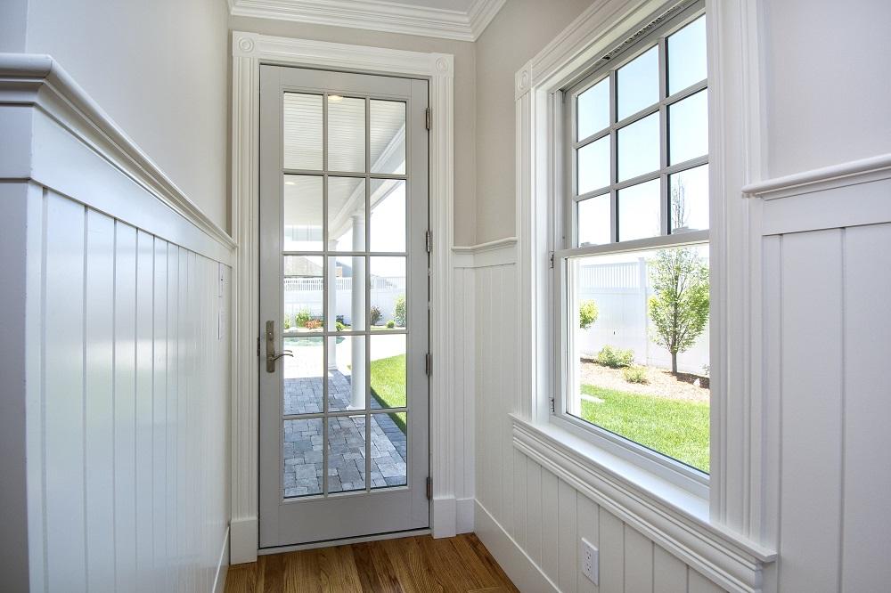 12 Coastline Drive Mashpee, MA 02649 - Photo 19 of 46 a view of an entryway with wooden floor and door