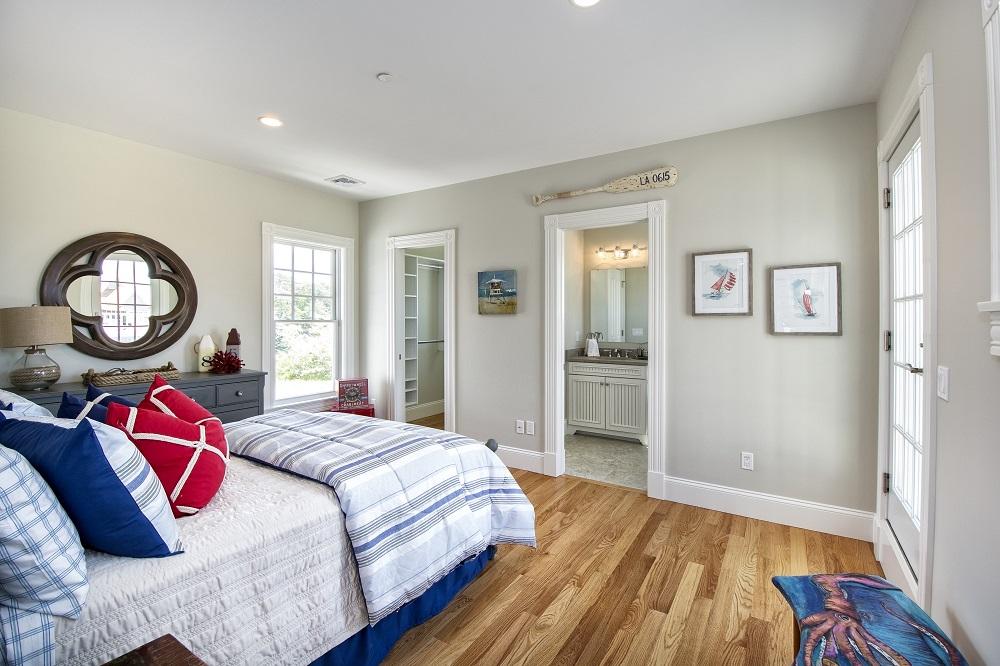 12 Coastline Drive Mashpee, MA 02649 - Photo 21 of 46 a bedroom with a bed and a window