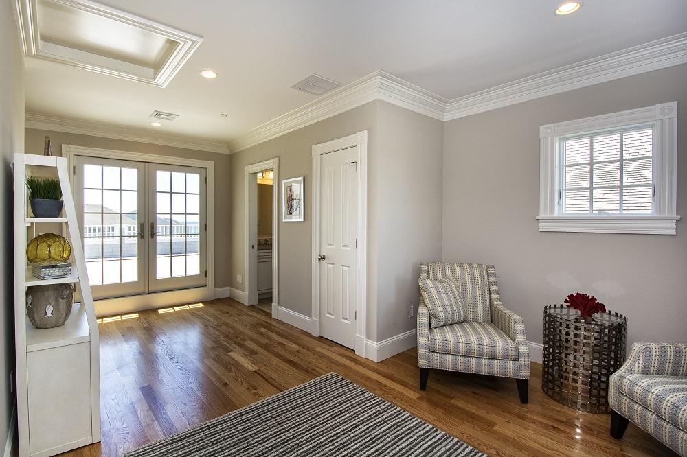 12 Coastline Drive Mashpee, MA 02649 - Photo 25 of 46 a living room with furniture and a window