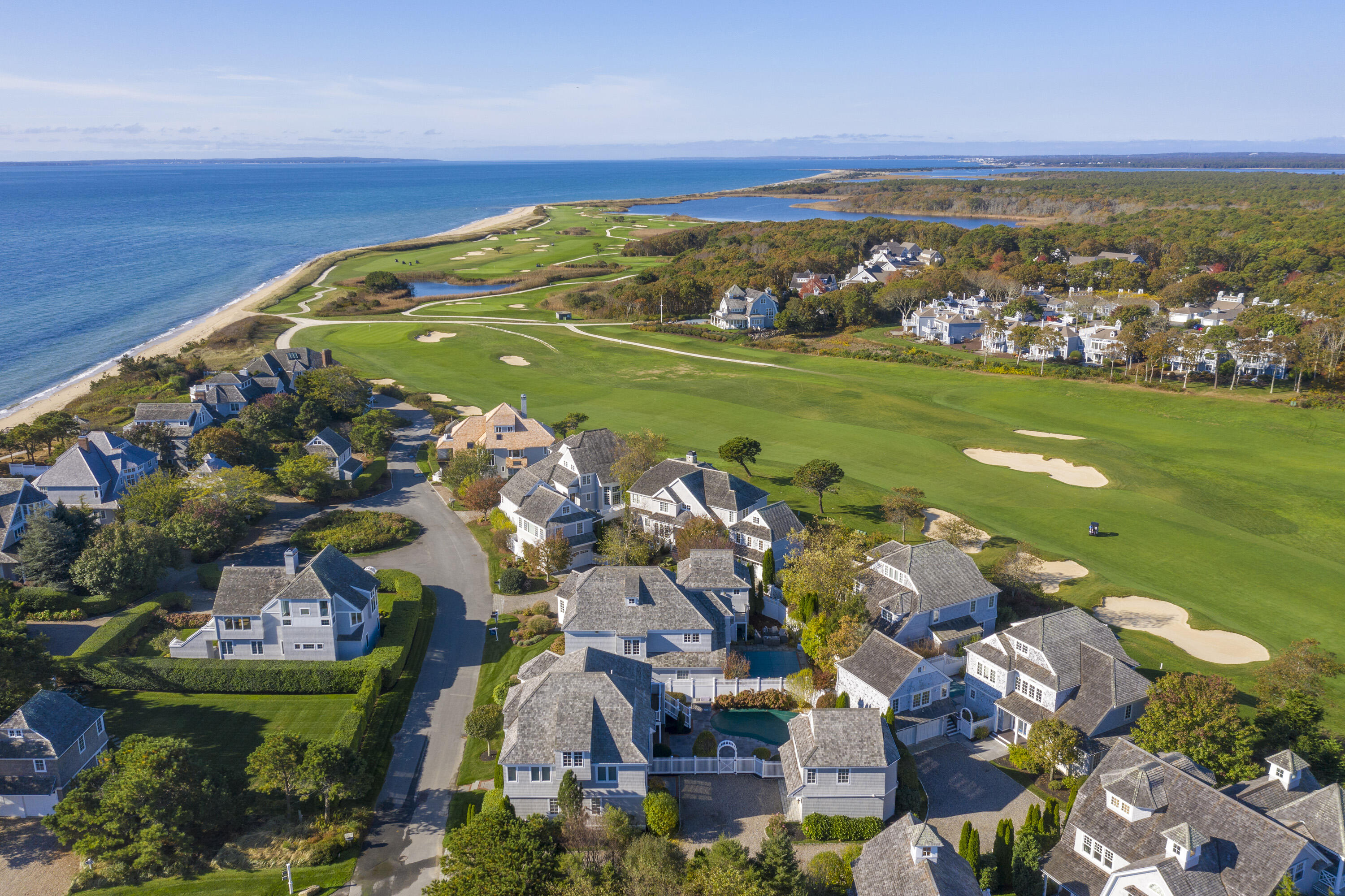 12 Coastline Drive Mashpee, MA 02649 - Photo 4 of 46 an aerial view of a houses with a ocean view
