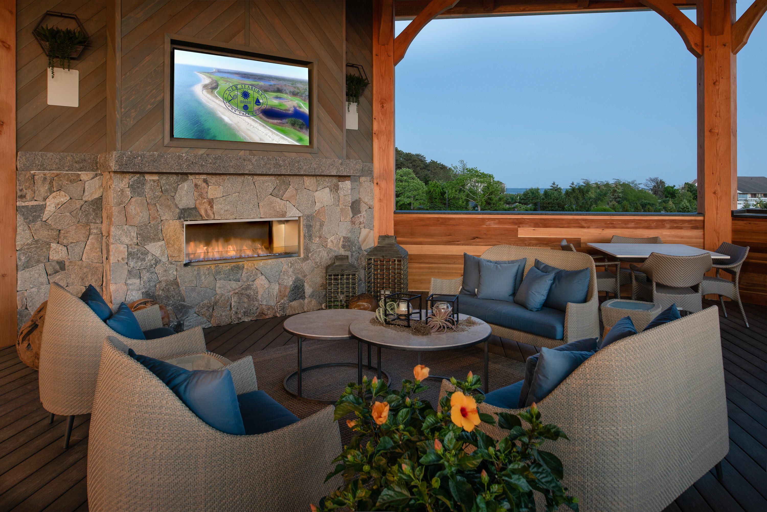 12 Coastline Drive Mashpee, MA 02649 - Photo 44 of 46 a outdoor living space with furniture and a fireplace