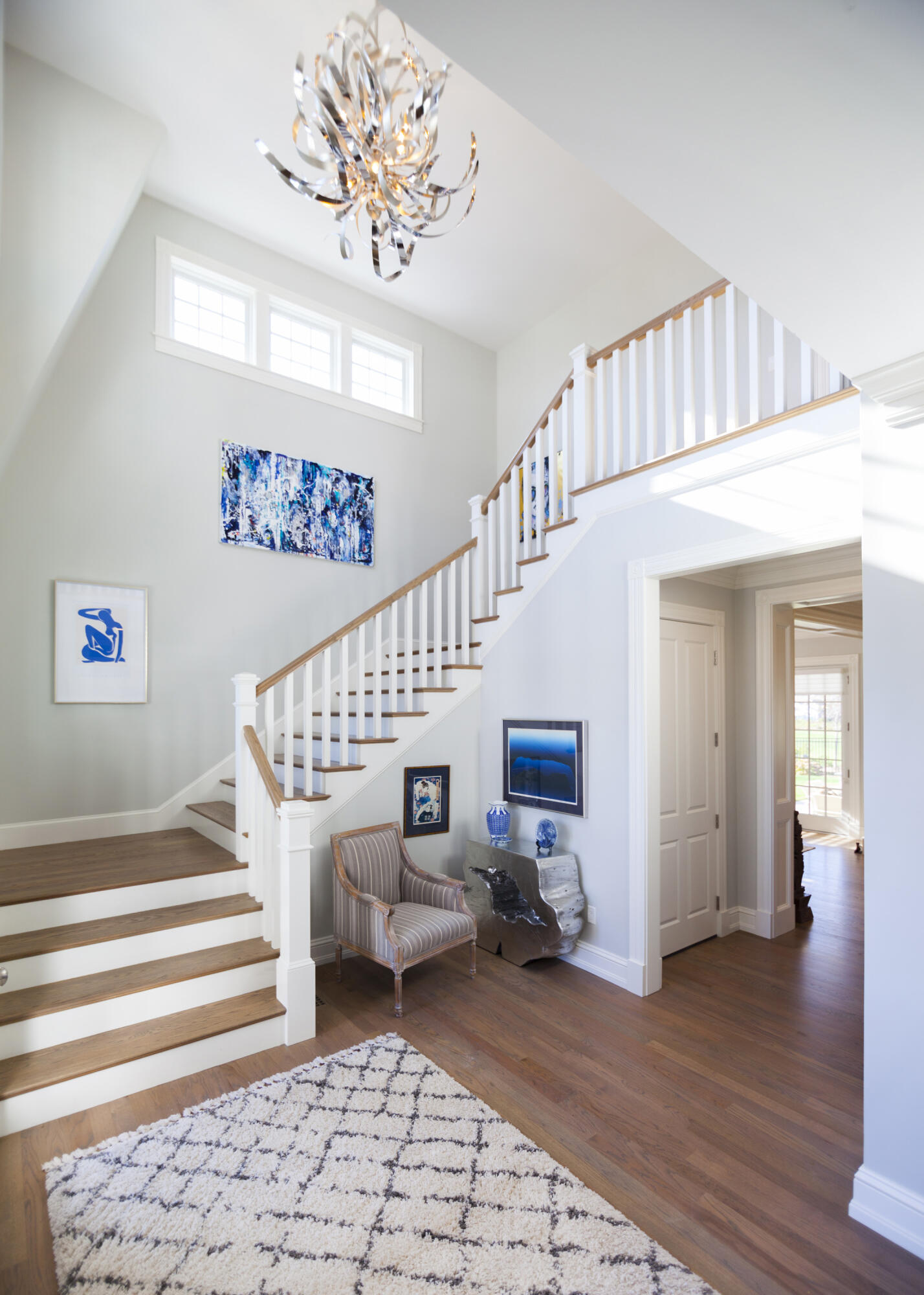 12 Coastline Drive Mashpee, MA 02649 - Photo 5 of 46 a view of entryway and hall with wooden floor