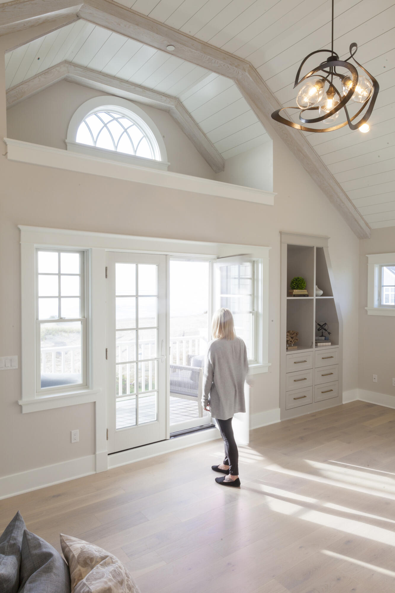 12 Coastline Drive Mashpee, MA 02649 - Photo 6 of 46 a view of a livingroom with wooden floor and a large window