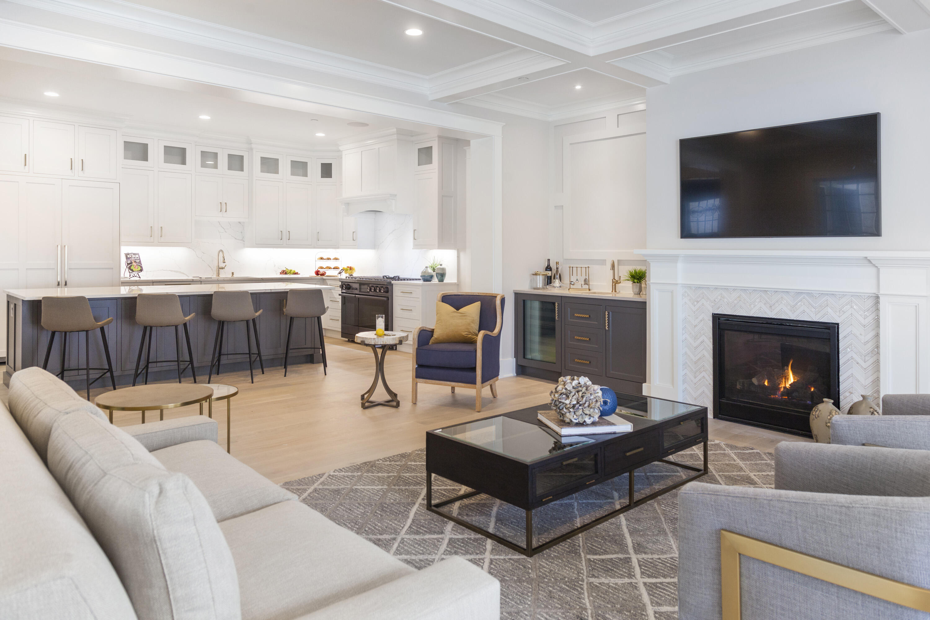 12 Coastline Drive Mashpee, MA 02649 - Photo 7 of 46 a living room with furniture a flat screen tv and a fireplace