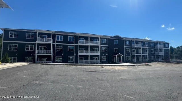 418 Circle Drive Taylor, PA 18517 - Photo 1 of 33 a front view of residential houses with yard