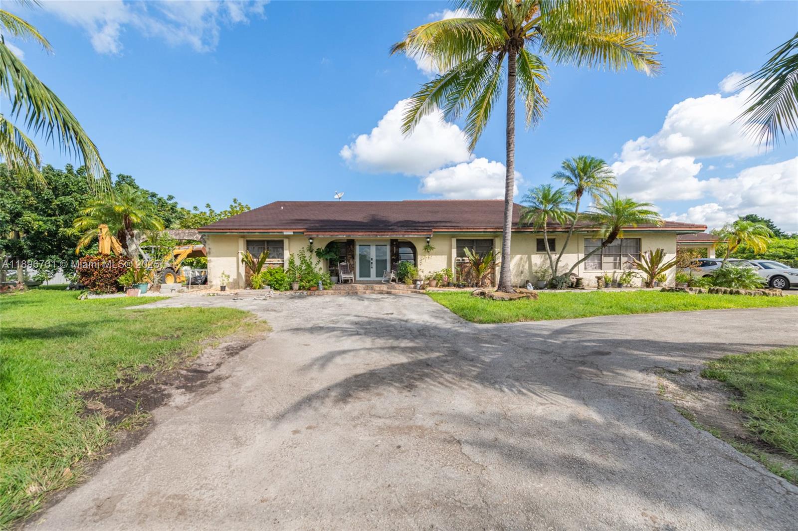 19491 Southwest 216th Street Miami, FL 33187 - Photo 1 of 37 a view of outdoor space yard and porch