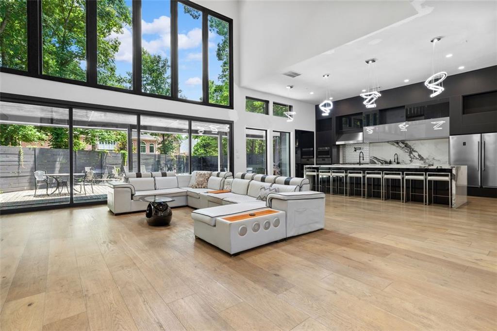 2401 Greenglade Road Northeast Atlanta, GA 30345 - Photo 11 of 64 a living room with furniture and a large window