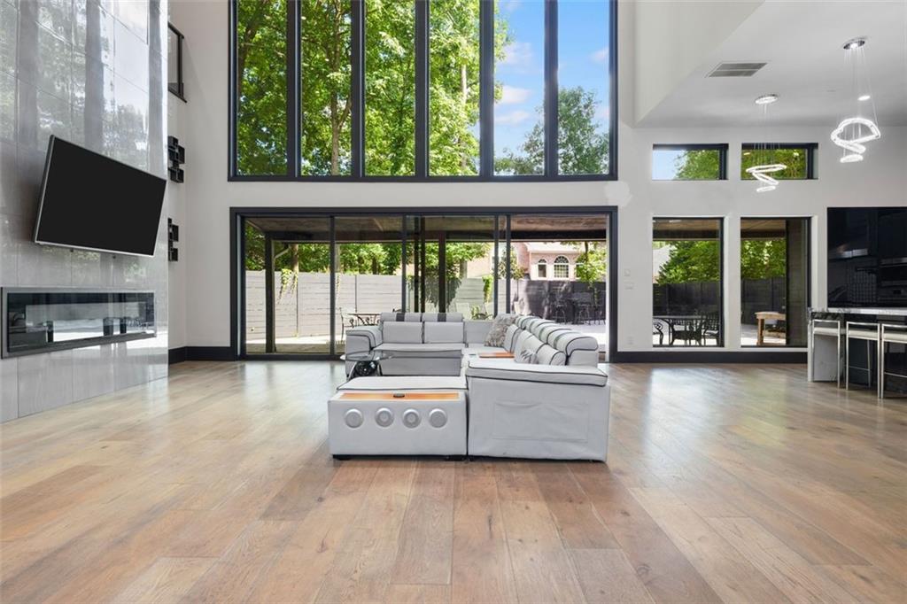2401 Greenglade Road Northeast Atlanta, GA 30345 - Photo 20 of 64 a living room with furniture and a flat screen tv