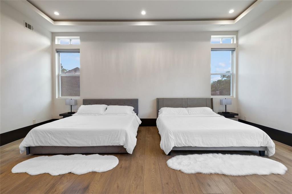 2401 Greenglade Road Northeast Atlanta, GA 30345 - Photo 23 of 64 a bedroom with two beds and a window