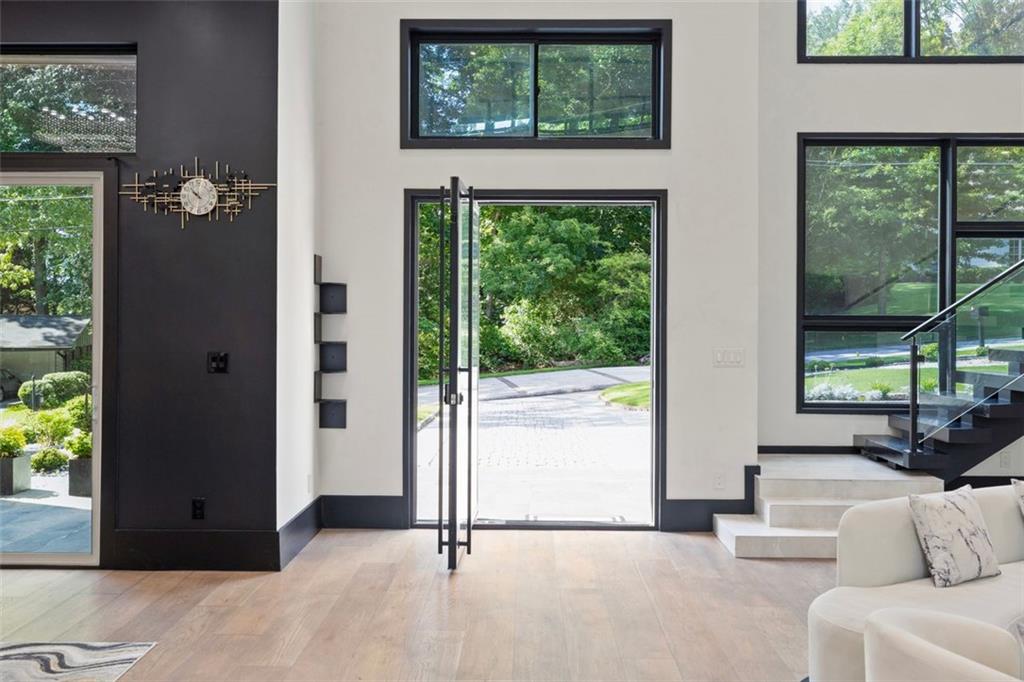 2401 Greenglade Road Northeast Atlanta, GA 30345 - Photo 3 of 64 a living room with furniture and a window