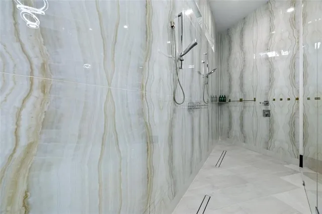 a large bed sitting in a bedroom and room