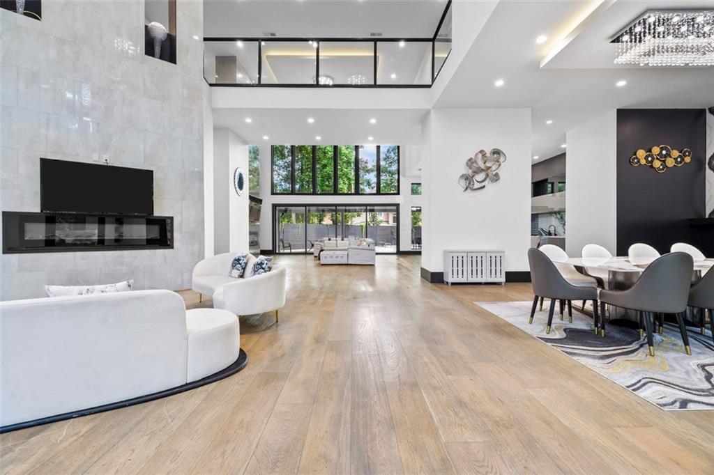 2401 Greenglade Road Northeast Atlanta, GA 30345 - Photo 4 of 64 a living room with furniture and a flat screen tv