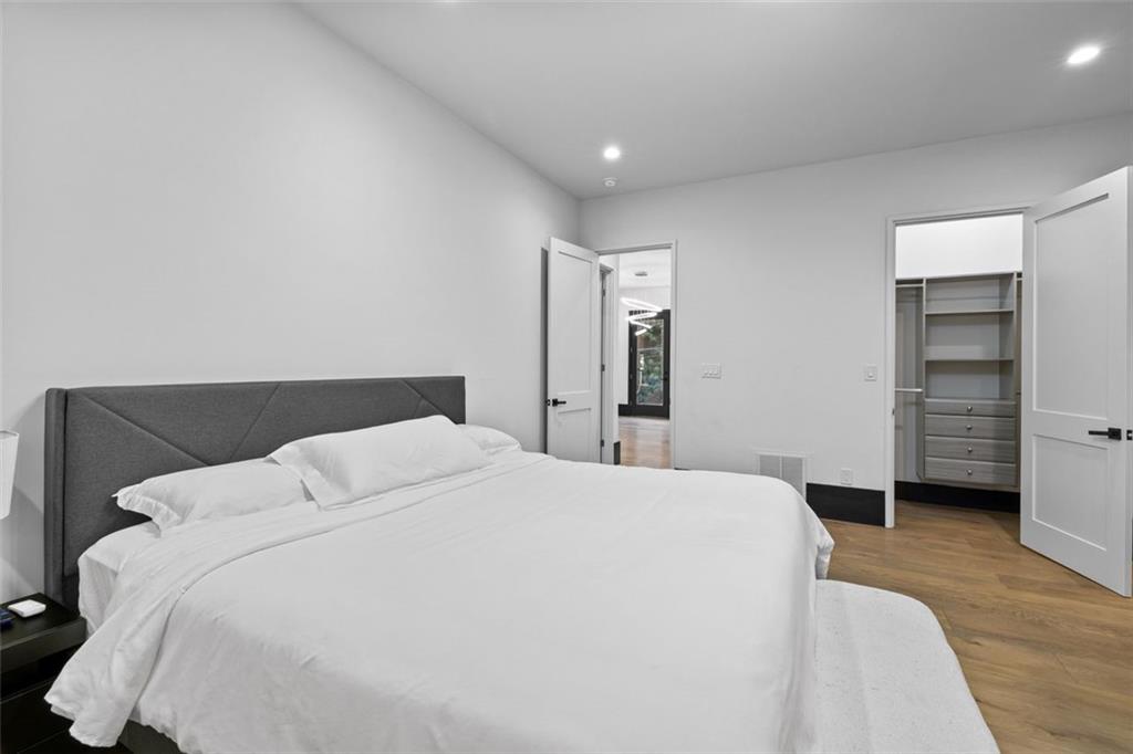 2401 Greenglade Road Northeast Atlanta, GA 30345 - Photo 47 of 64 a large bed sitting in a bedroom and room