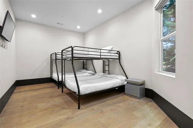 an aerial view of multiple houses with yard