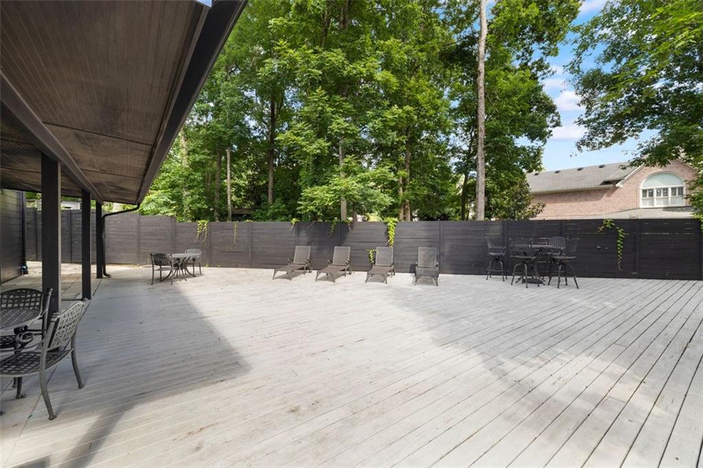 2401 Greenglade Road Northeast Atlanta, GA 30345 - Photo 54 of 64 a view of a backyard and sitting area