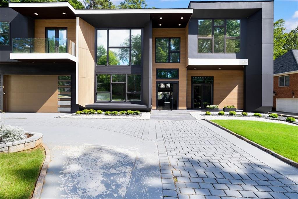 2401 Greenglade Road Northeast Atlanta, GA 30345 - Photo 61 of 64 a view of a house with sitting area and yard