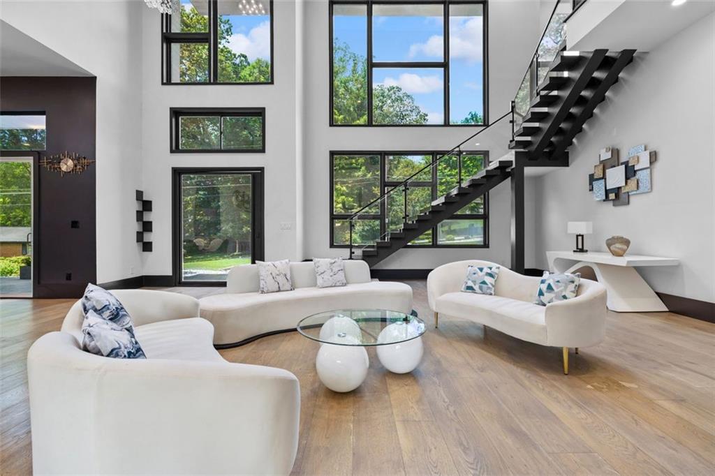 2401 Greenglade Road Northeast Atlanta, GA 30345 - Photo 10 of 64 a living room with furniture and a large window