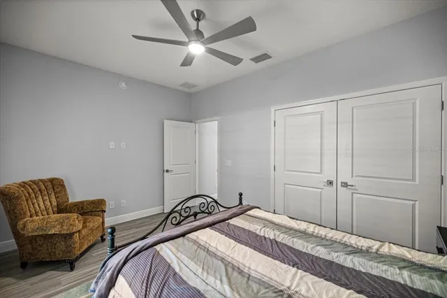 a bedroom with a bed and furniture