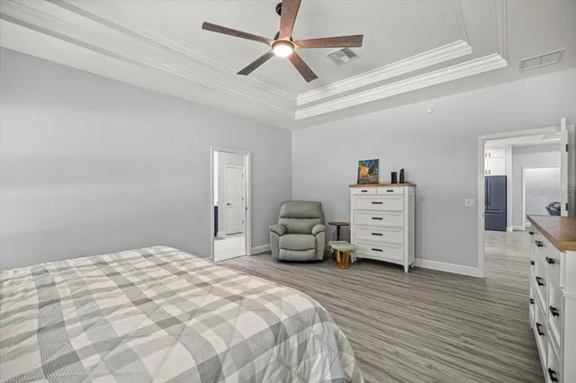 a bedroom with a bed and a closet