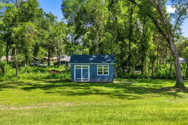a house view with a garden space