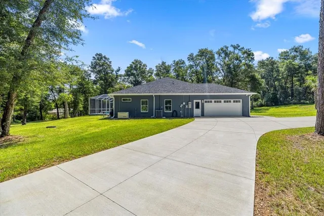 a view of house with garden space
