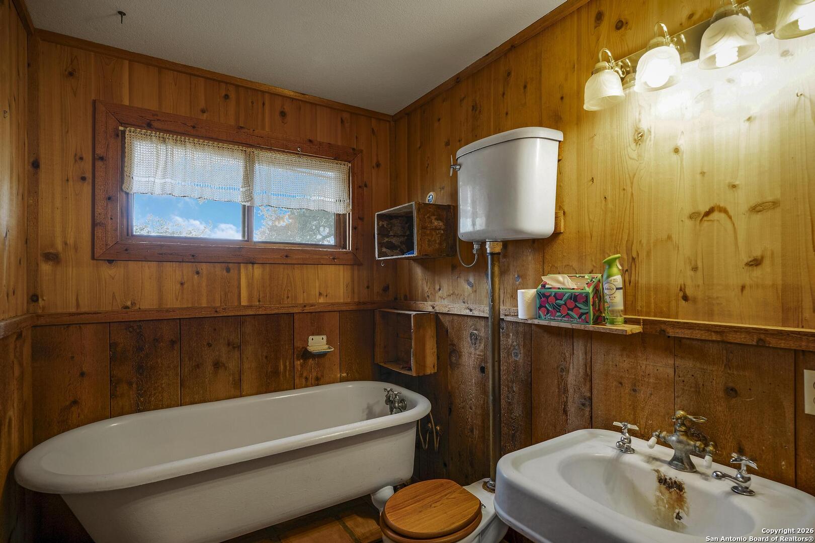 360 Kirk Lane Bulverde, TX 78163 - Photo 13 of 50 a bathroom with a toilet sink and mirror