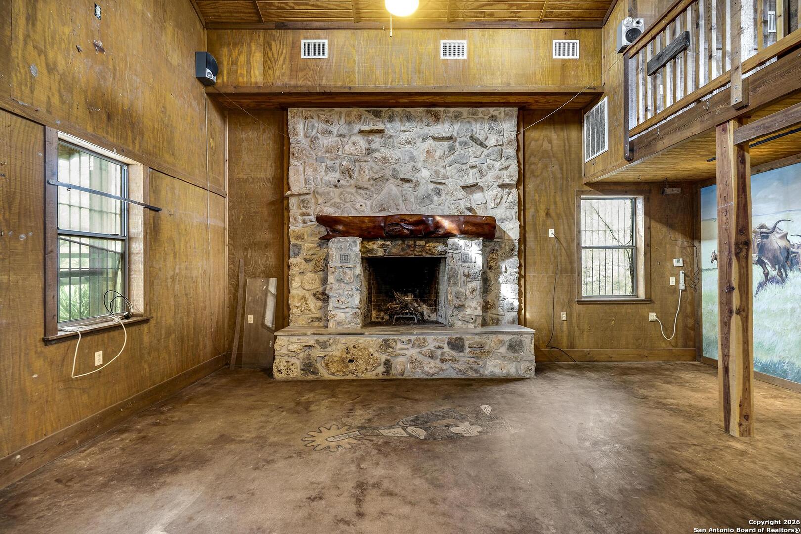 360 Kirk Lane Bulverde, TX 78163 - Photo 19 of 50 a living room with a fireplace