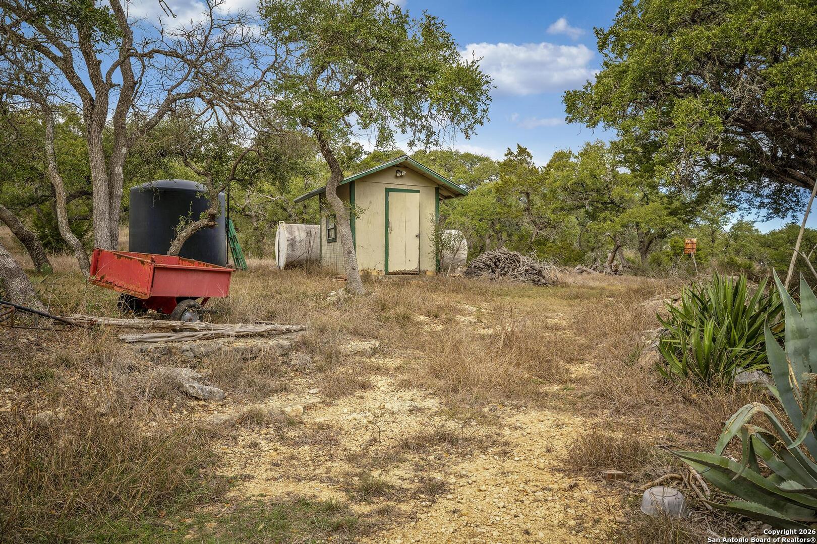360 Kirk Lane Bulverde, TX 78163 - Photo 27 of 50 a front view of a house with a yard