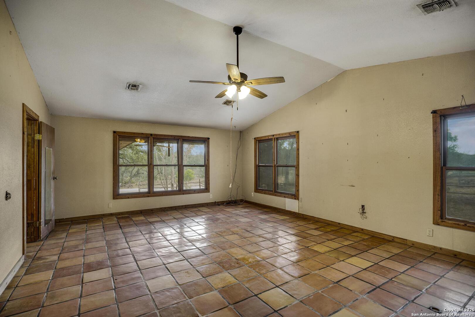 360 Kirk Lane Bulverde, TX 78163 - Photo 9 of 50 a view of n empty room with window
