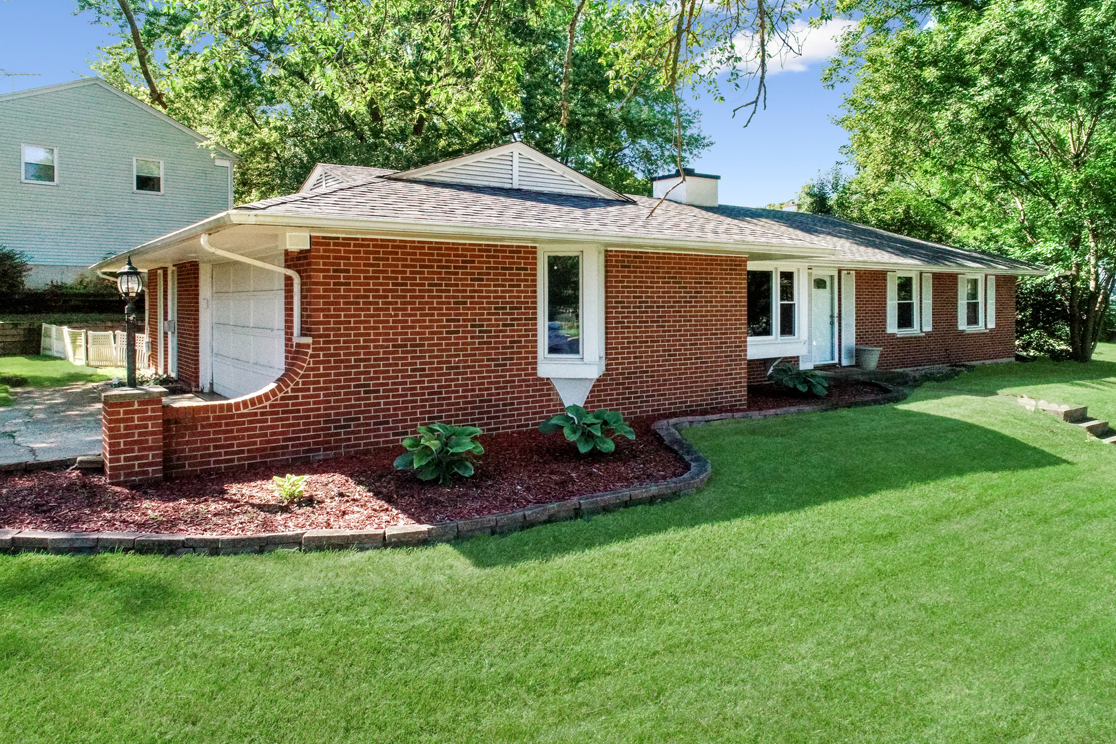 44 Aldon Road Montgomery, IL 60538 - Photo 1 of 24 a front view of a house with a garden