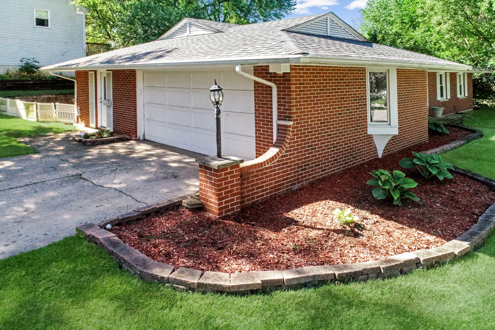 44 Aldon Road Montgomery, IL 60538 - Photo 2 of 24 a view of a house with a yard and sitting area